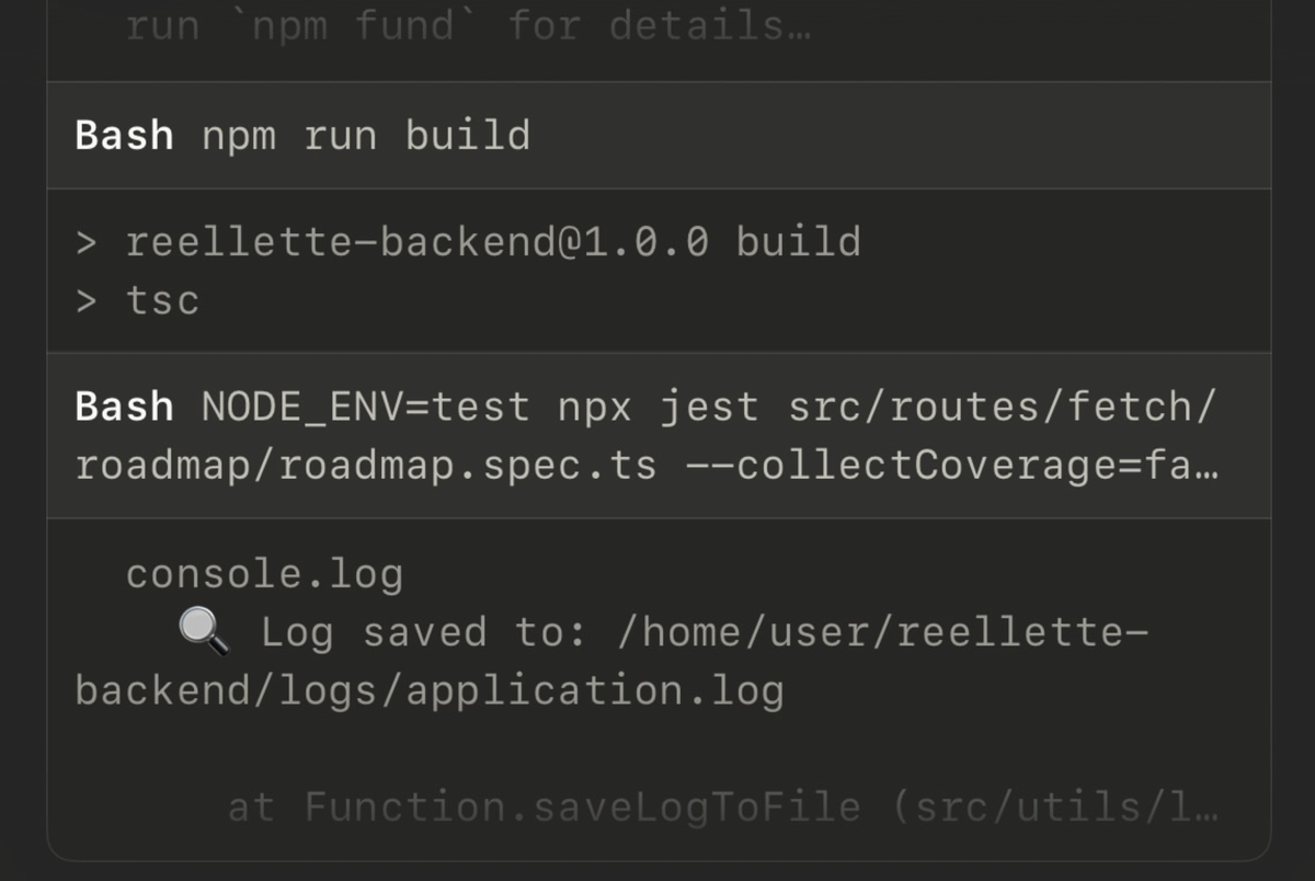 Terminal output showing npm build and Jest test commands